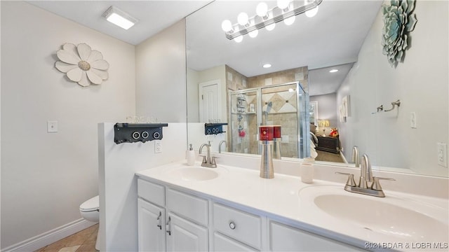 3 Willow Rd, Eldon, MO 65026 - full bathroom with a stall shower, toilet, double vanity, tile patterned floors, and recessed lighting