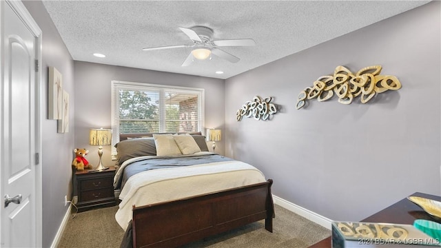 3 Willow Rd, Eldon, MO 65026 - carpeted bedroom featuring baseboards, a textured ceiling, and ceiling fan