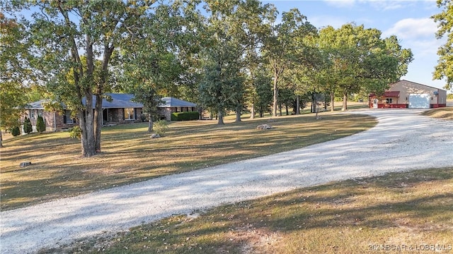 3 Willow Rd, Eldon, MO 65026 - view of front of home with driveway and a detached garage