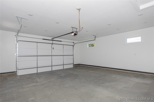 garage featuring a garage door opener