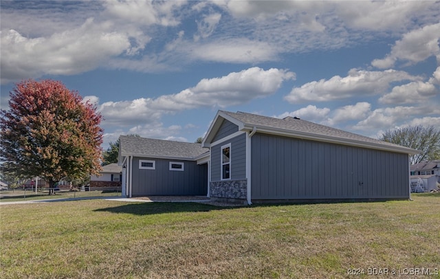 view of property exterior featuring a yard