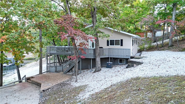 back of property with a deck