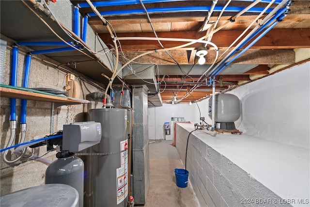 utility room featuring gas water heater