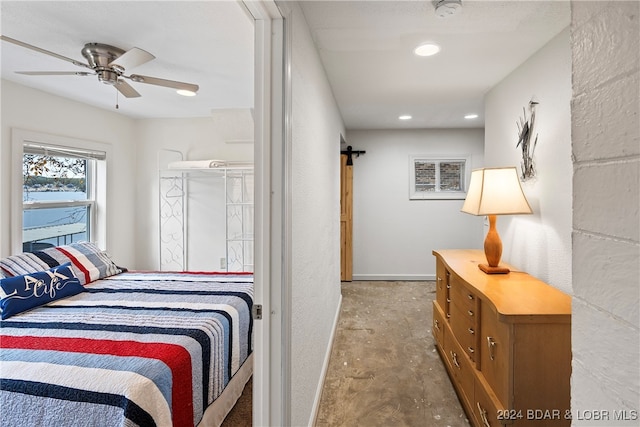 bedroom featuring concrete floors and ceiling fan