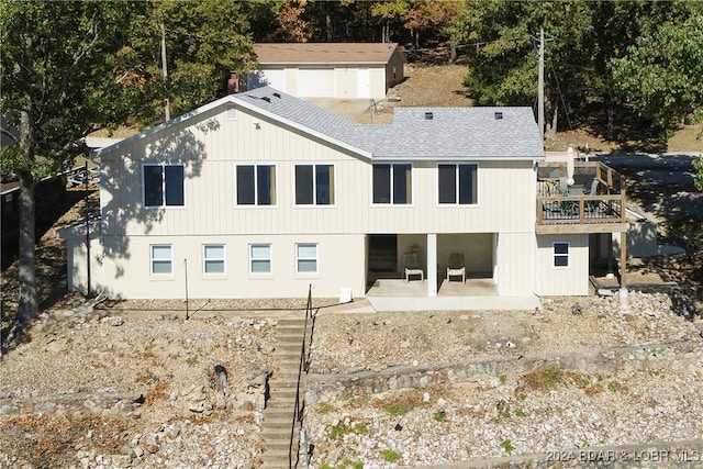 rear view of house with a patio