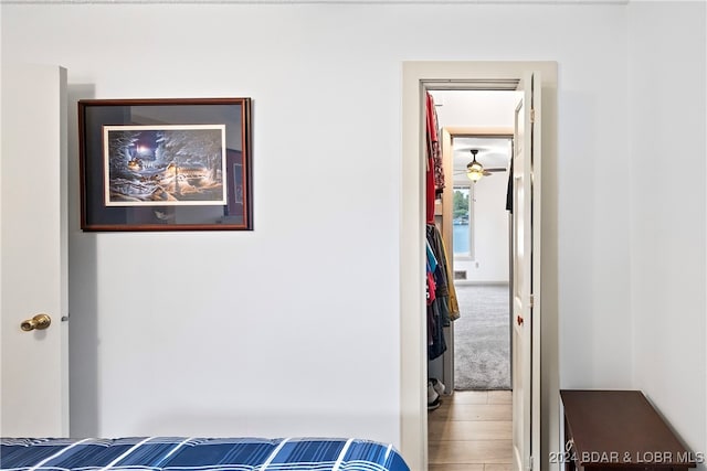 bedroom with wood-type flooring