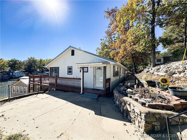 view of front of property with a wooden deck