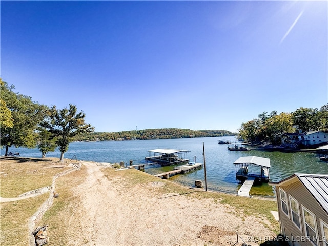 view of water feature with a boat dock