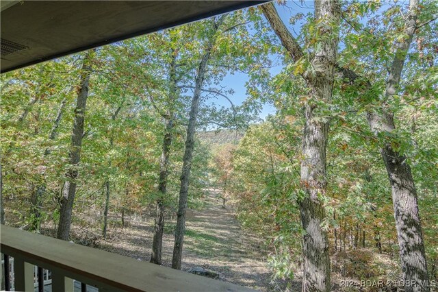 641 Porter Mill Springs Rd, Sunrise Beach, MO 65079 - exterior space with a forest view
