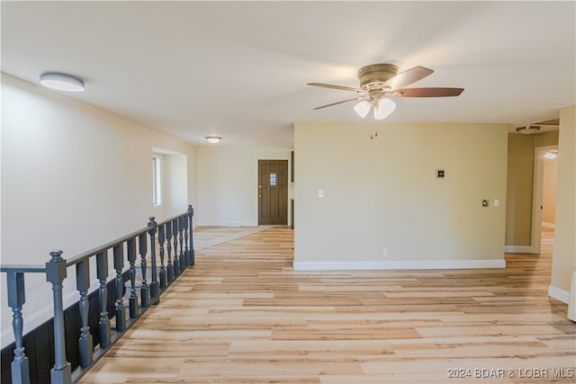 unfurnished room with light hardwood / wood-style flooring