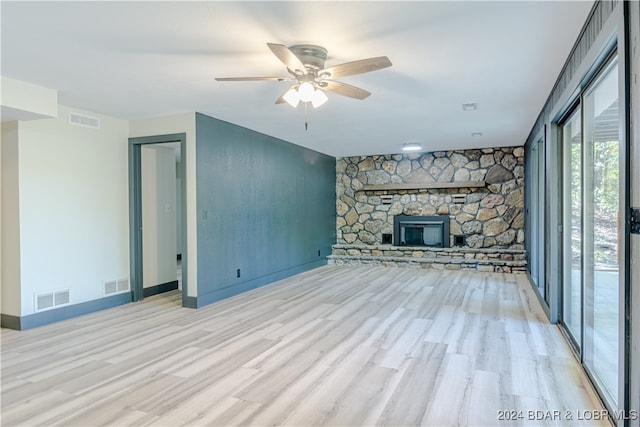 unfurnished living room with light hardwood / wood-style floors and ceiling fan