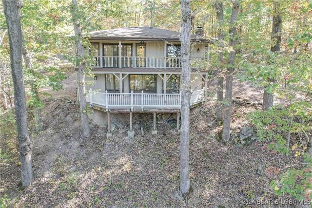 641 Porter Mill Springs Rd, Sunrise Beach, MO 65079 - back of property featuring a balcony