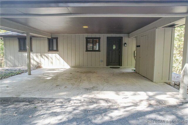 641 Porter Mill Springs Rd, Sunrise Beach, MO 65079 - doorway to property featuring a carport