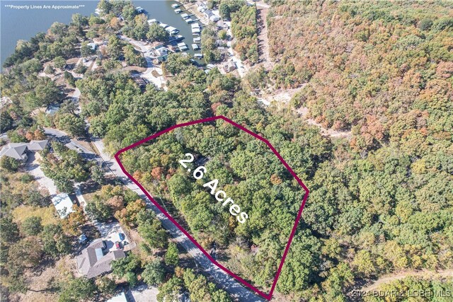 641 Porter Mill Springs Rd, Sunrise Beach, MO 65079 - aerial view of property and surrounding area with a forest and property boundaries highlighted