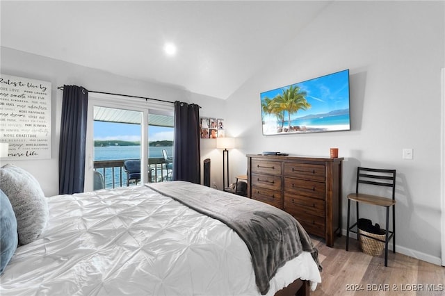 bedroom with recessed lighting, wood finished floors, access to outside, baseboards, and lofted ceiling