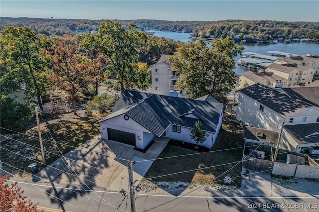 birds eye view of property featuring a water view