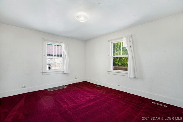 view of carpeted spare room