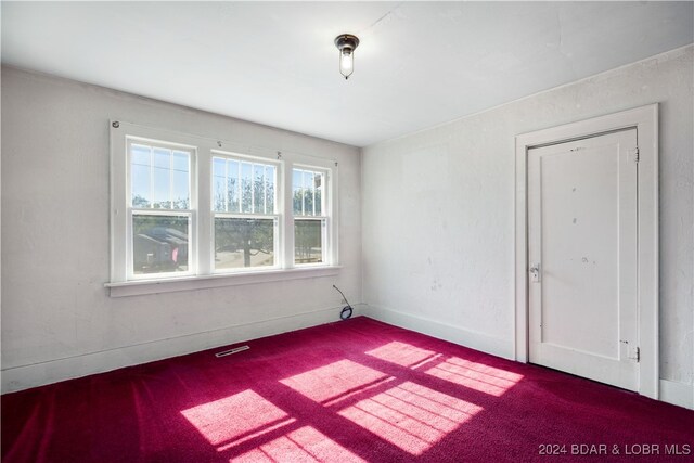 view of carpeted empty room