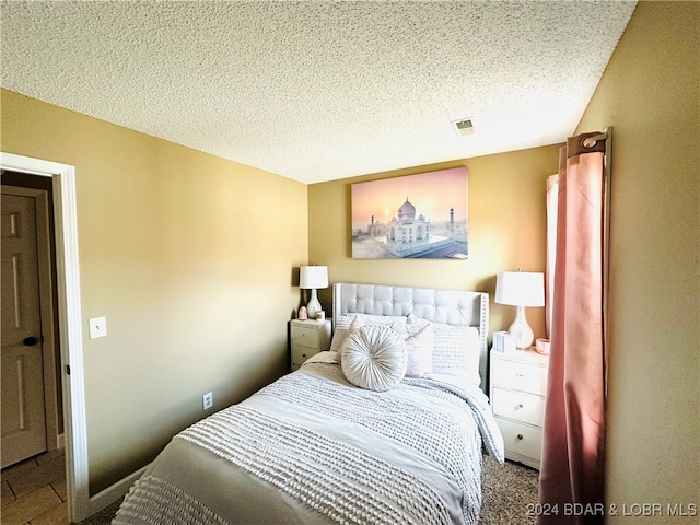 bedroom with a textured ceiling