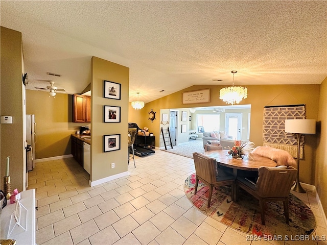 dining area featuring light tile patterned floors, a textured ceiling, lofted ceiling, and ceiling fan with notable chandelier