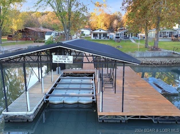 dock area with a water view