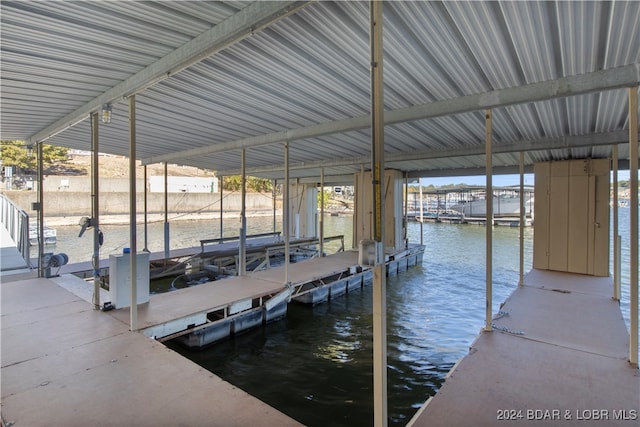 dock area featuring a water view