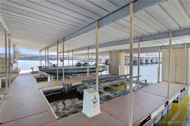 dock area featuring a water view