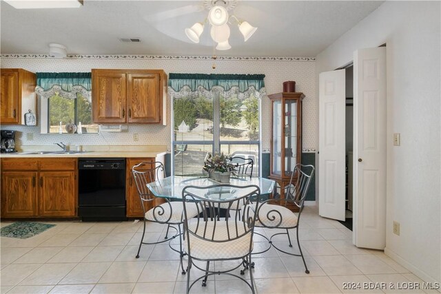 775 Winn Rd Unit 4I, Osage Beach, MO 65065 - kitchen featuring black dishwasher, a sink, light countertops, ceiling fan, and light tile patterned flooring