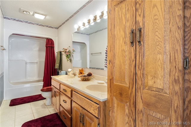 full bathroom with shower / tub combo, vanity, a textured ceiling, tile patterned flooring, and toilet