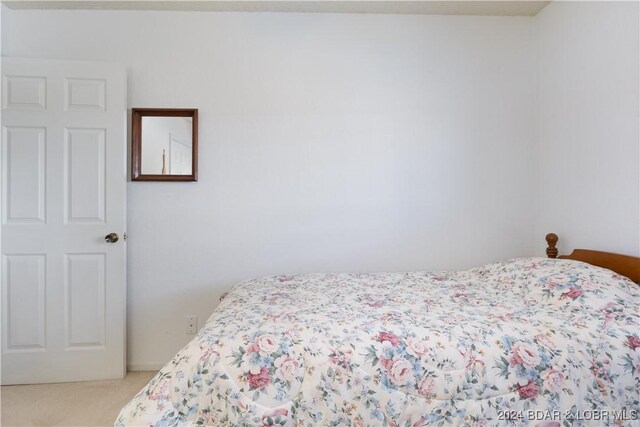775 Winn Rd Unit 4I, Osage Beach, MO 65065 - bedroom featuring light carpet