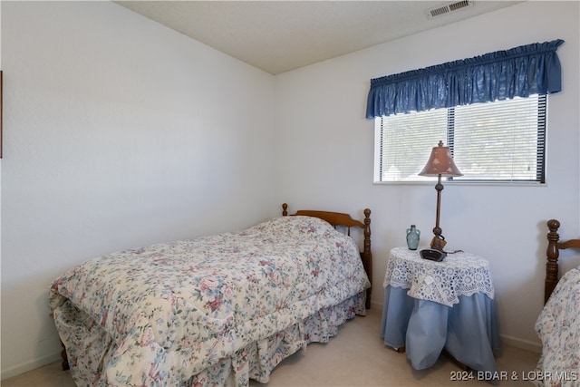 bedroom featuring carpet floors