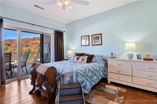 bedroom with ceiling fan, access to outside, and wood-type flooring