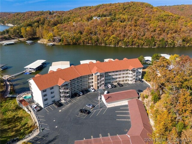 birds eye view of property featuring a water view