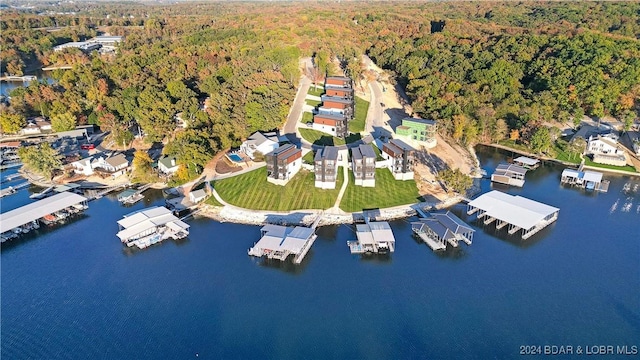 6 Forest Lake Cir, Lake Ozark, MO 65049 - aerial overview of property's location with a heavily wooded area and a nearby body of water