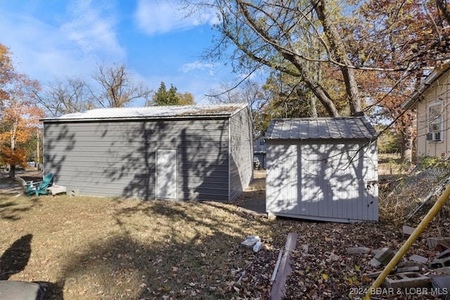 view of outbuilding with a lawn