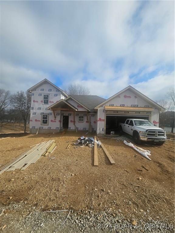 property under construction with a garage