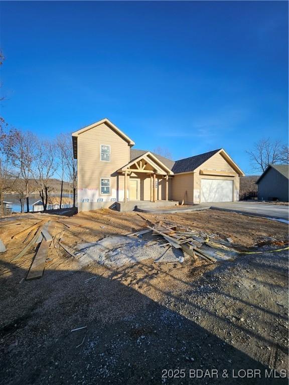 view of front of property with a garage