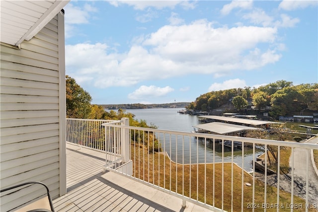 balcony featuring a water view