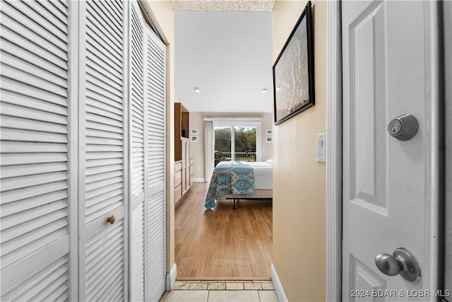 corridor featuring light wood-type flooring