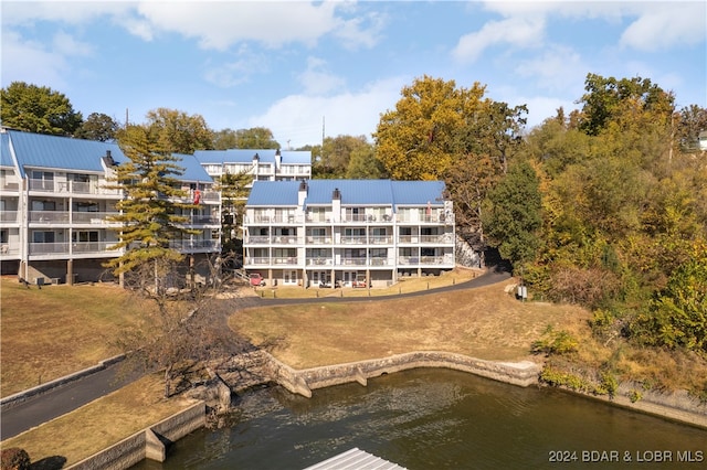 view of property with a water view