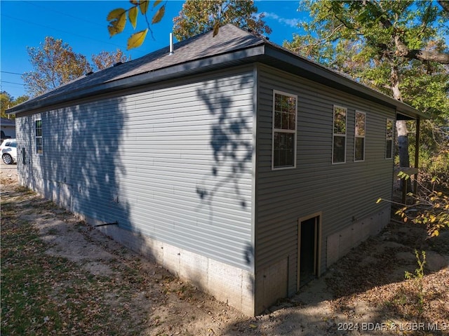 view of property exterior with crawl space