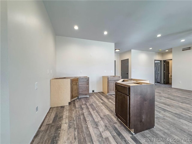 kitchen featuring wood finished floors, visible vents, and recessed lighting