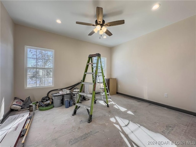 workout room featuring baseboards, a ceiling fan, and recessed lighting