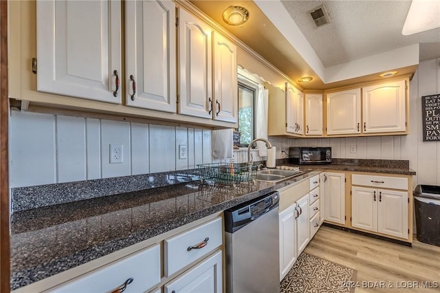 kitchen with dishwasher, white cabinetry, sink, and light hardwood / wood-style flooring