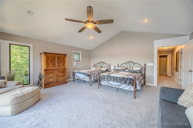 bedroom featuring carpet, multiple windows, and vaulted ceiling