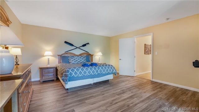 bedroom featuring light hardwood / wood-style floors