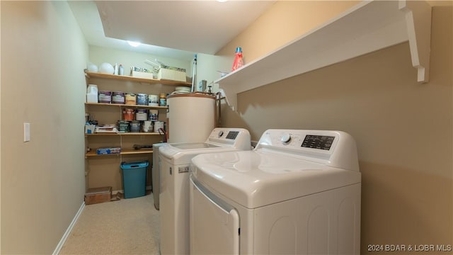 63 Elbow Cay Dr, Osage Beach, MO 65065 - washroom featuring water heater, washing machine and clothes dryer, light colored carpet, and baseboards