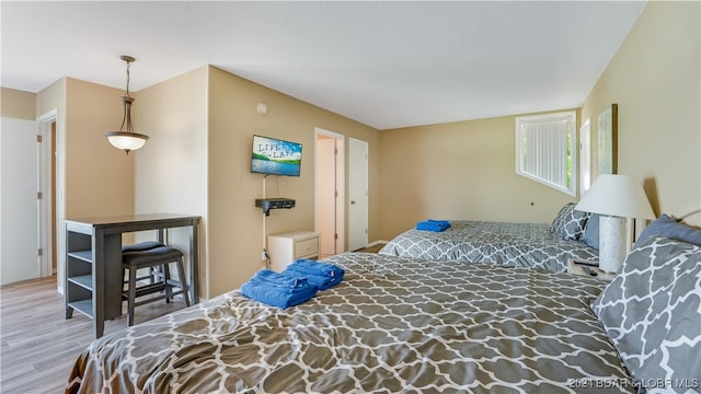 bedroom featuring hardwood / wood-style floors