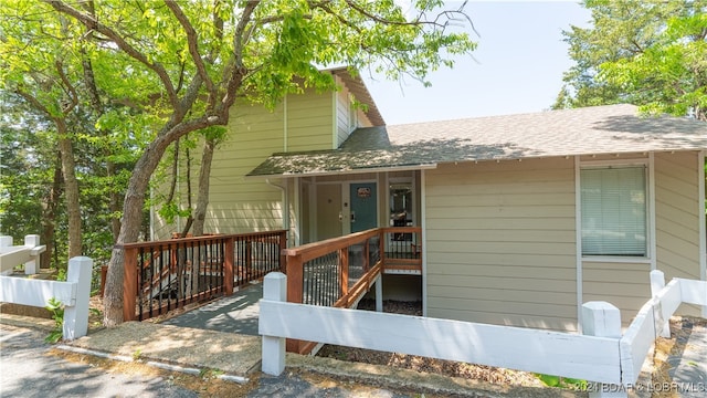 exterior space featuring a wooden deck