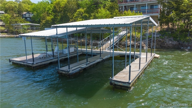 view of dock with a water view